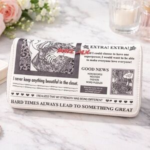 Betsey Johnson newspaper style wallet / clutch